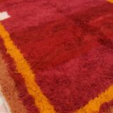 Minimalist burgundy cherry red shaggy berber rug