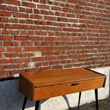 Vintage wooden console/desk with tapered legs.