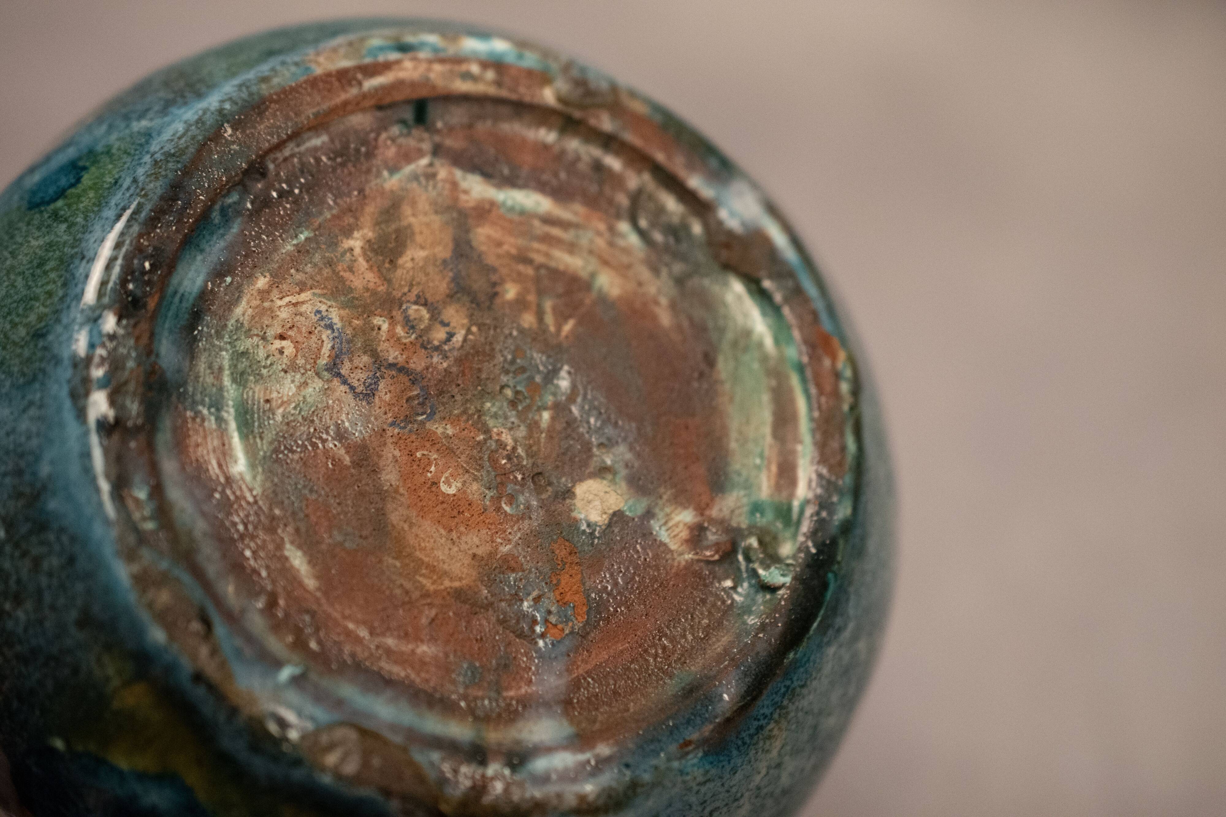 Small flamed stoneware vase in shades of blue and orange