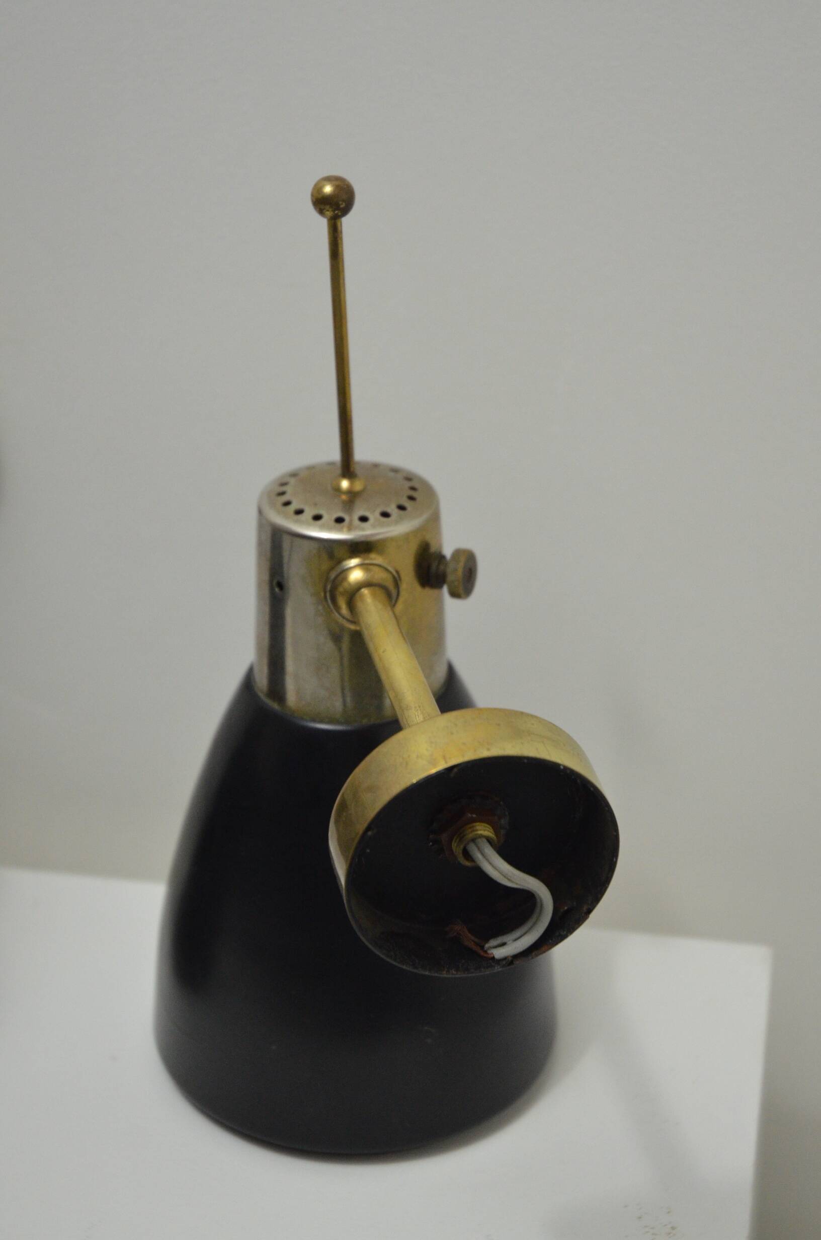 Pair of Monix wall lights in black lacquered metal and brass