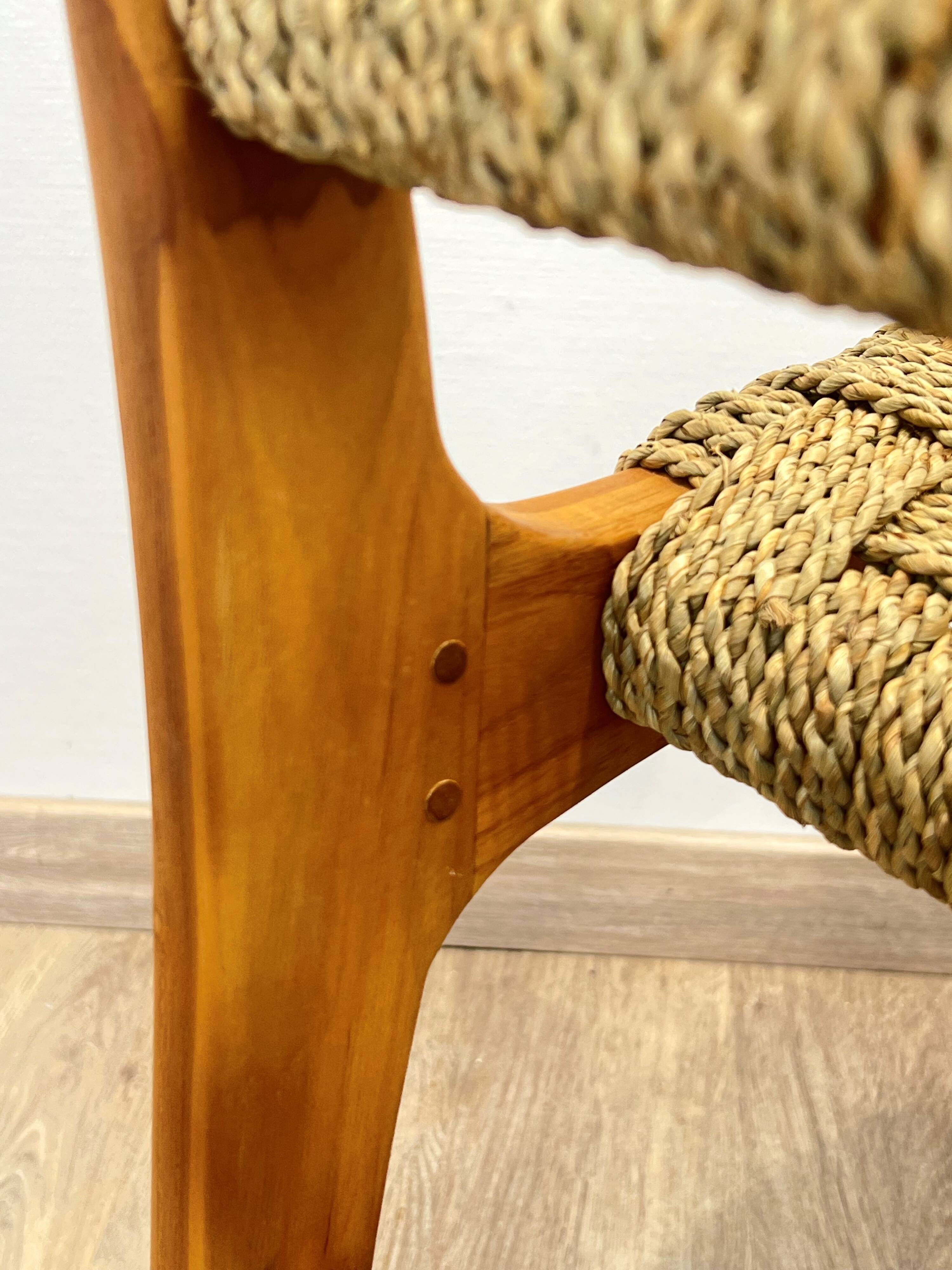 Pair of woven teak armchairs