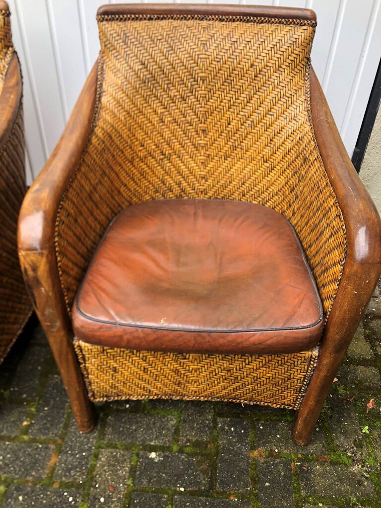 2 colonial armchairs in wood, rattan and leather, 1950s