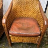 2 colonial armchairs in wood, rattan and leather, 1950s