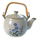 Théière en grès fleurie et anse en rotin.