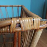 Rattan wicker cradle on wooden wheels