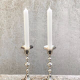 Two antique metal candle holders
