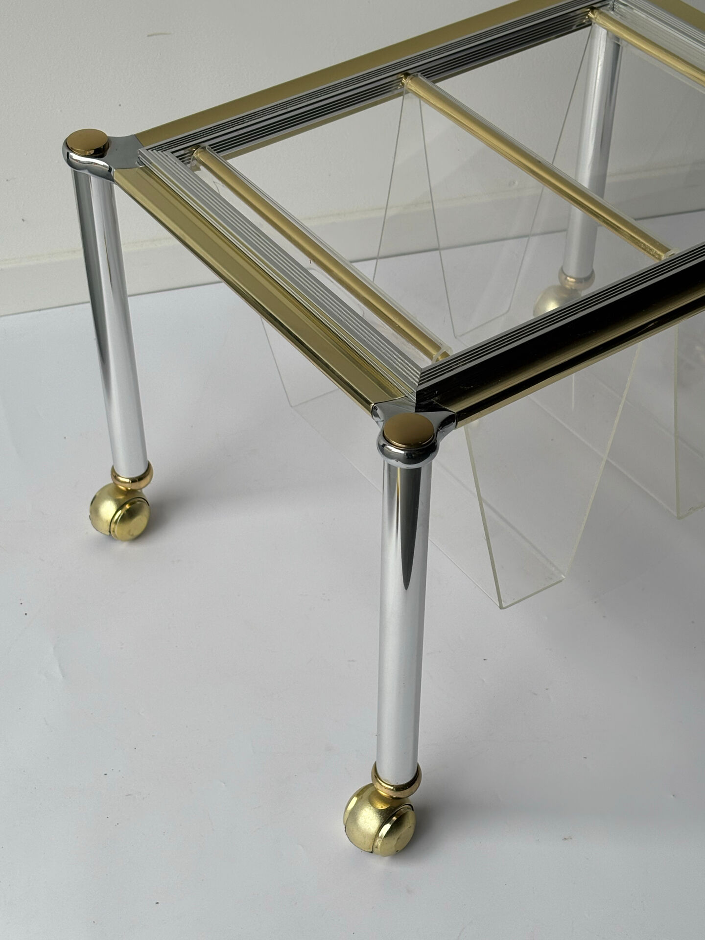 Magazine rack in Plexiglas and gold and chrome metal, 1970