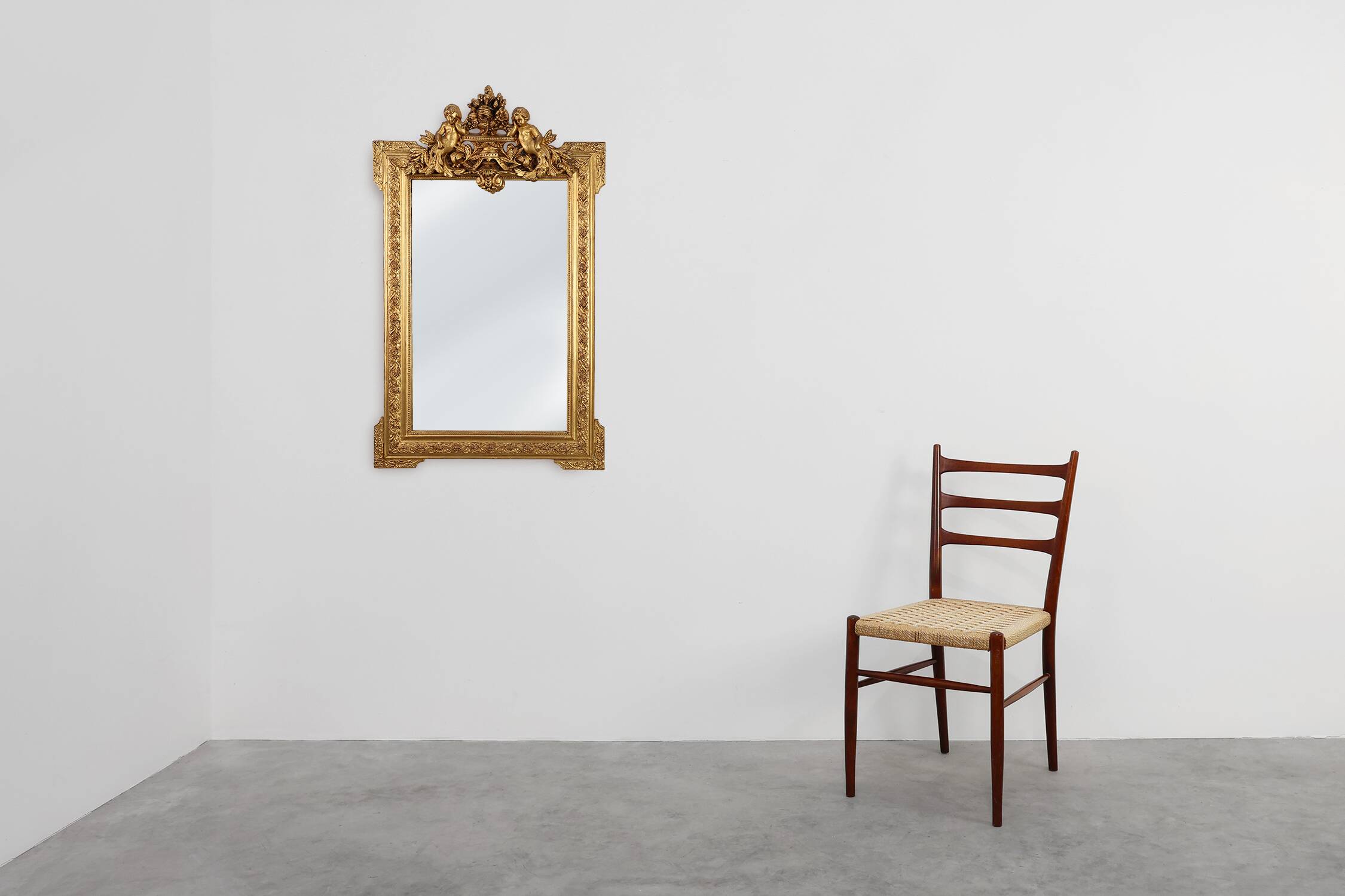 French rococo style richly sculpted gilted oak mirror, 19th century