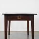 Antique French fruitwood dining table with 2 drawers and patina