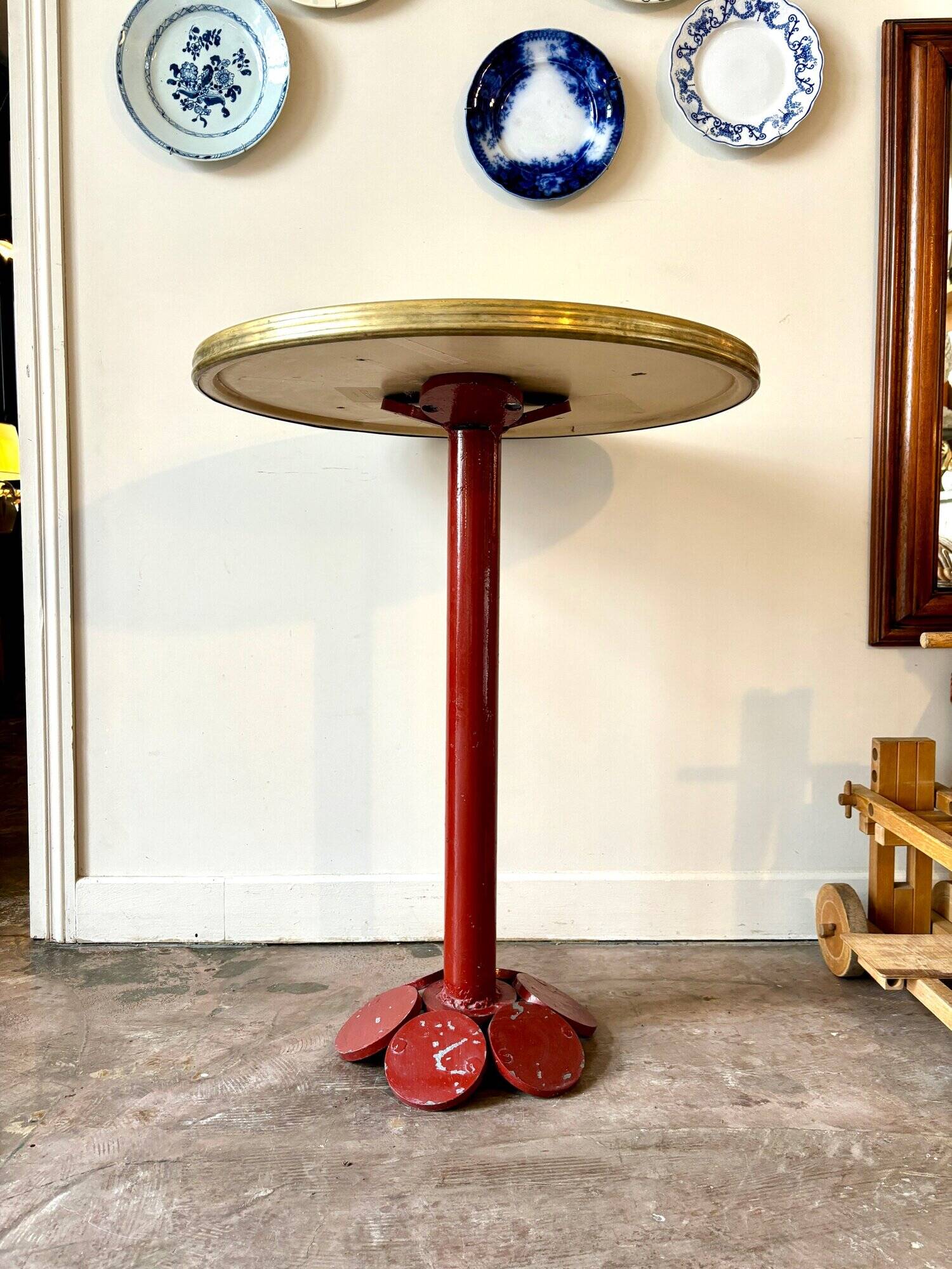 Bistro table in burgundy metal and beige melamine