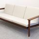 Three-seater modernist teak sofa, France circa 1950.