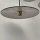 Suspensions in enamelled sheets