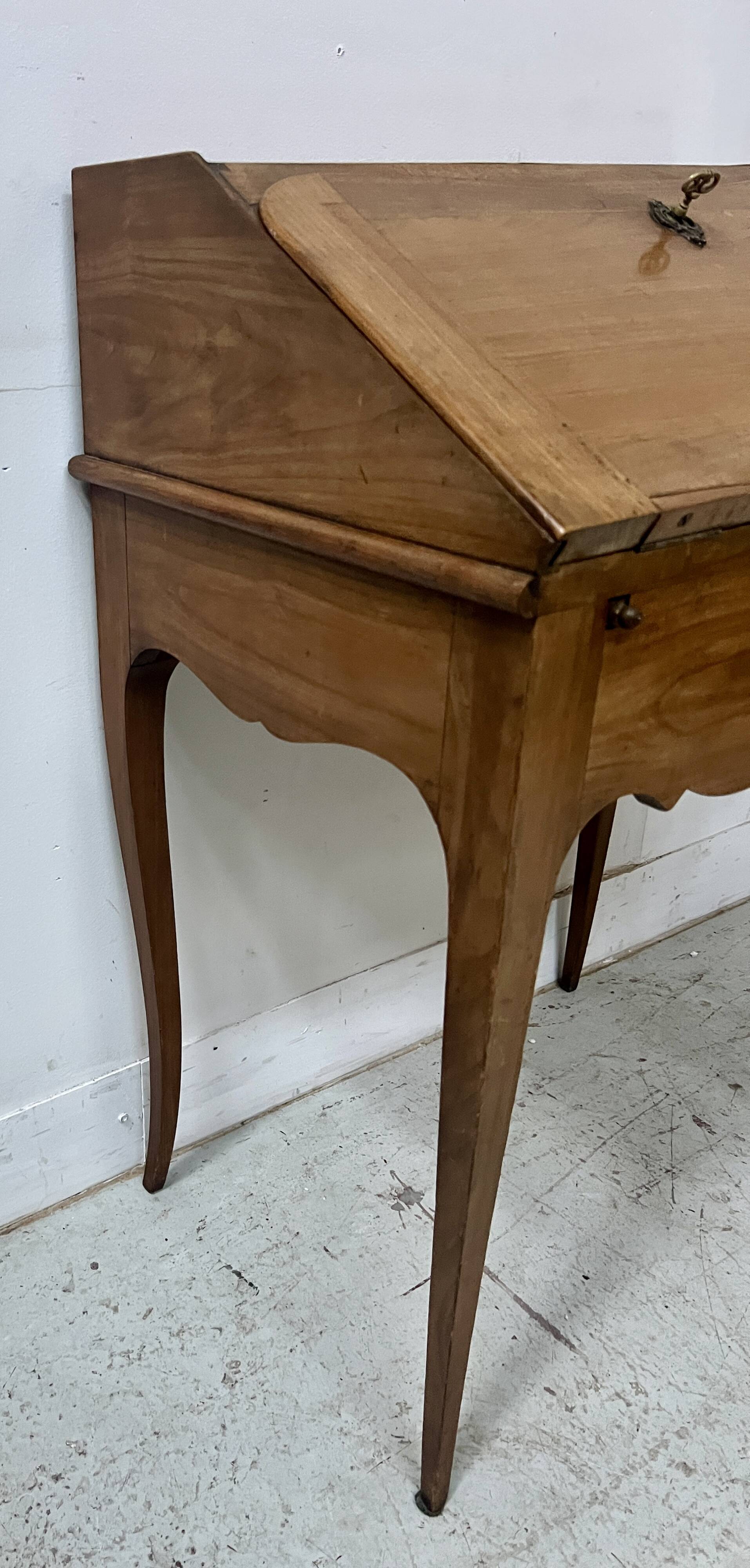 20th century slant-front desk in solid cherry wood