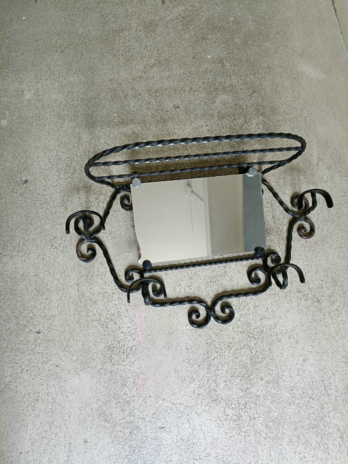 Twisted wrought iron wall-mounted coat rack