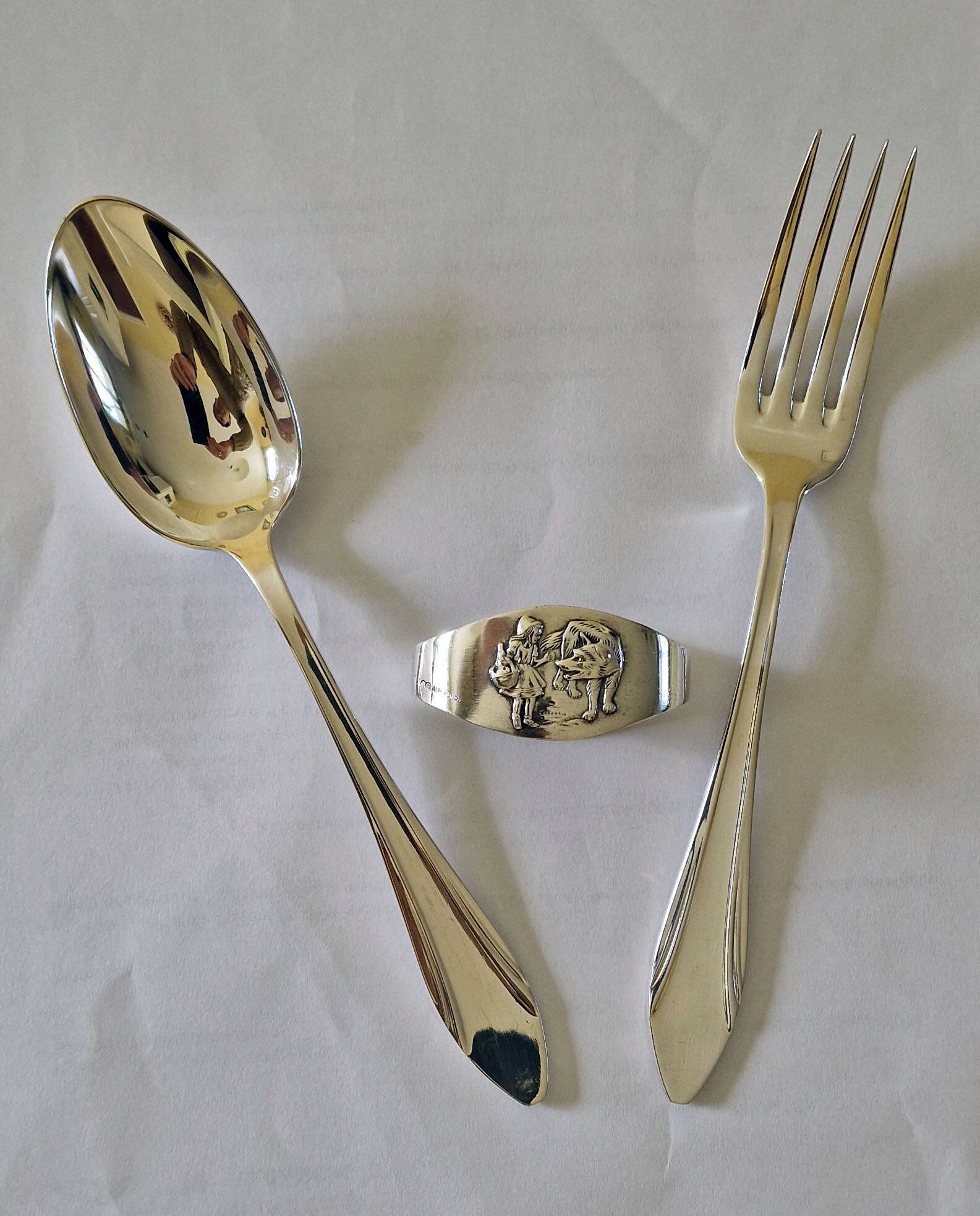 Birth cutlery and napkin ring