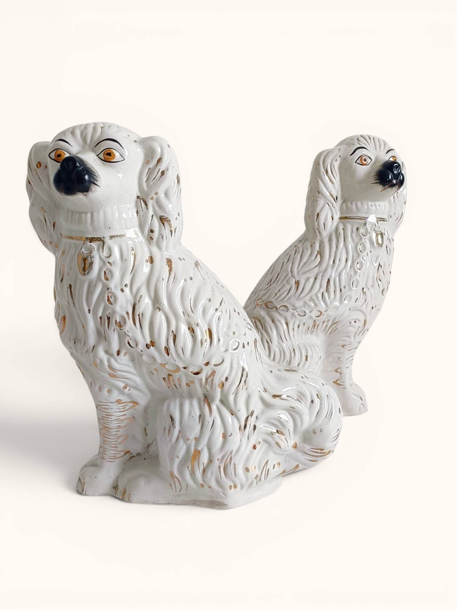 Pair of King Charles Spaniel dogs in Staffordshire majolica style.