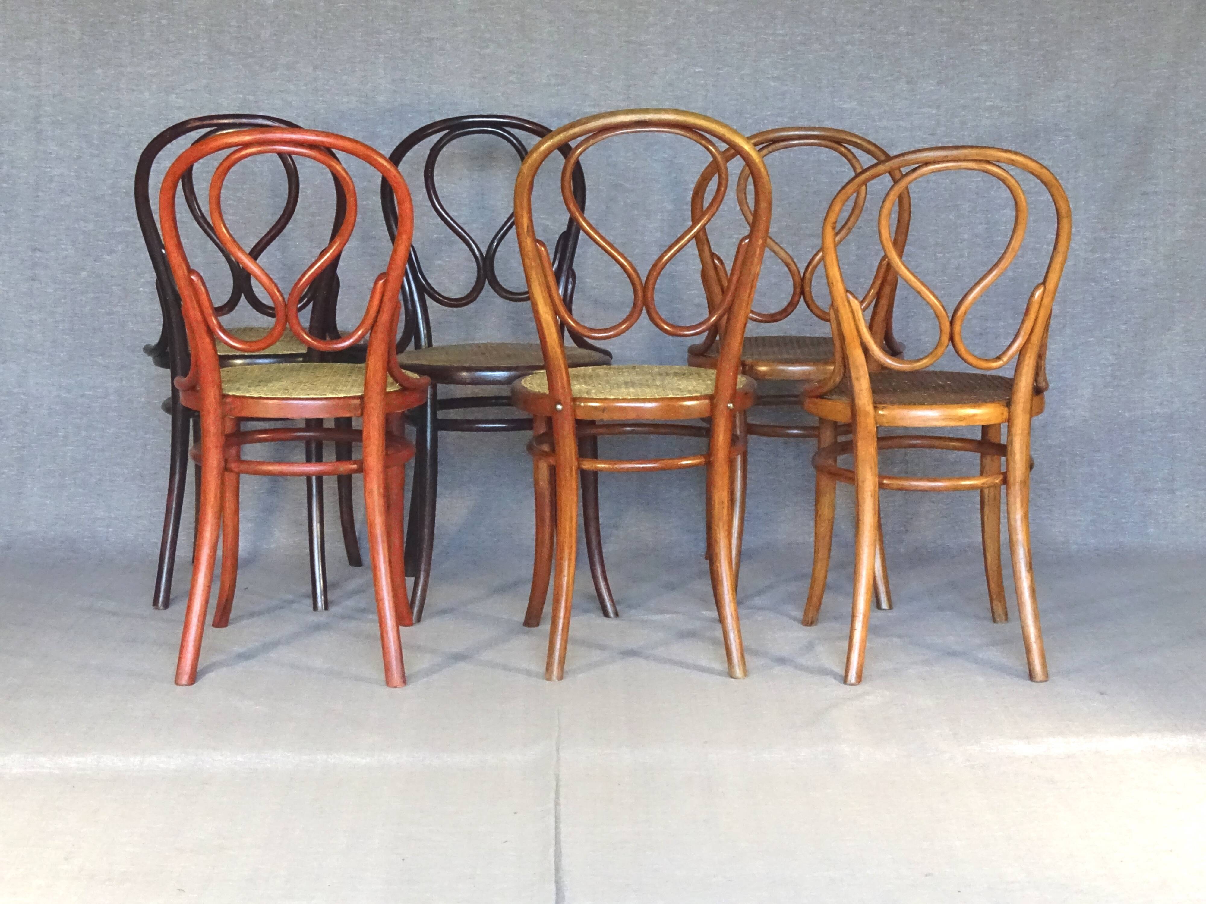Set of 6 chairs no. 20 known as "omega" caned, including 3 thonet.
