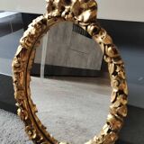 Hollywood Regency style oval Victorian mirror. In antique gold wood. 31 x 21cm