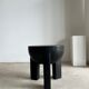 Black mango wood tripod side table with a semi-spherical top, height: 45 cm, diameter: 44 cm.