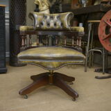 Rotating office chair in mahogany and upholstered leather, from the 1960s