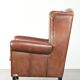 Large sheepskin wingback armchair in timeless English style
