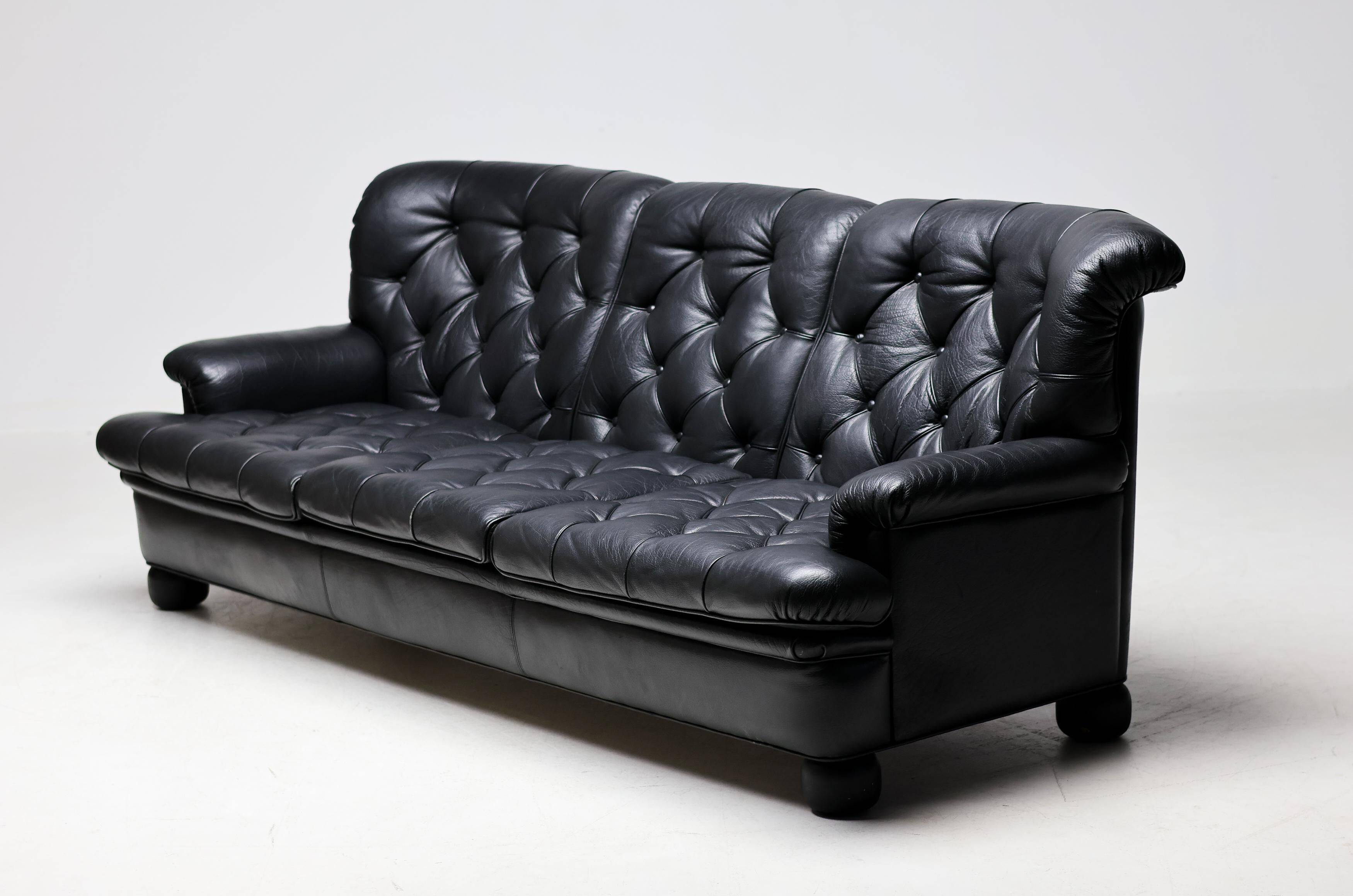 Three-seater sofa "Jupiter" in black leather by Arne Norell, Sweden, 1960.