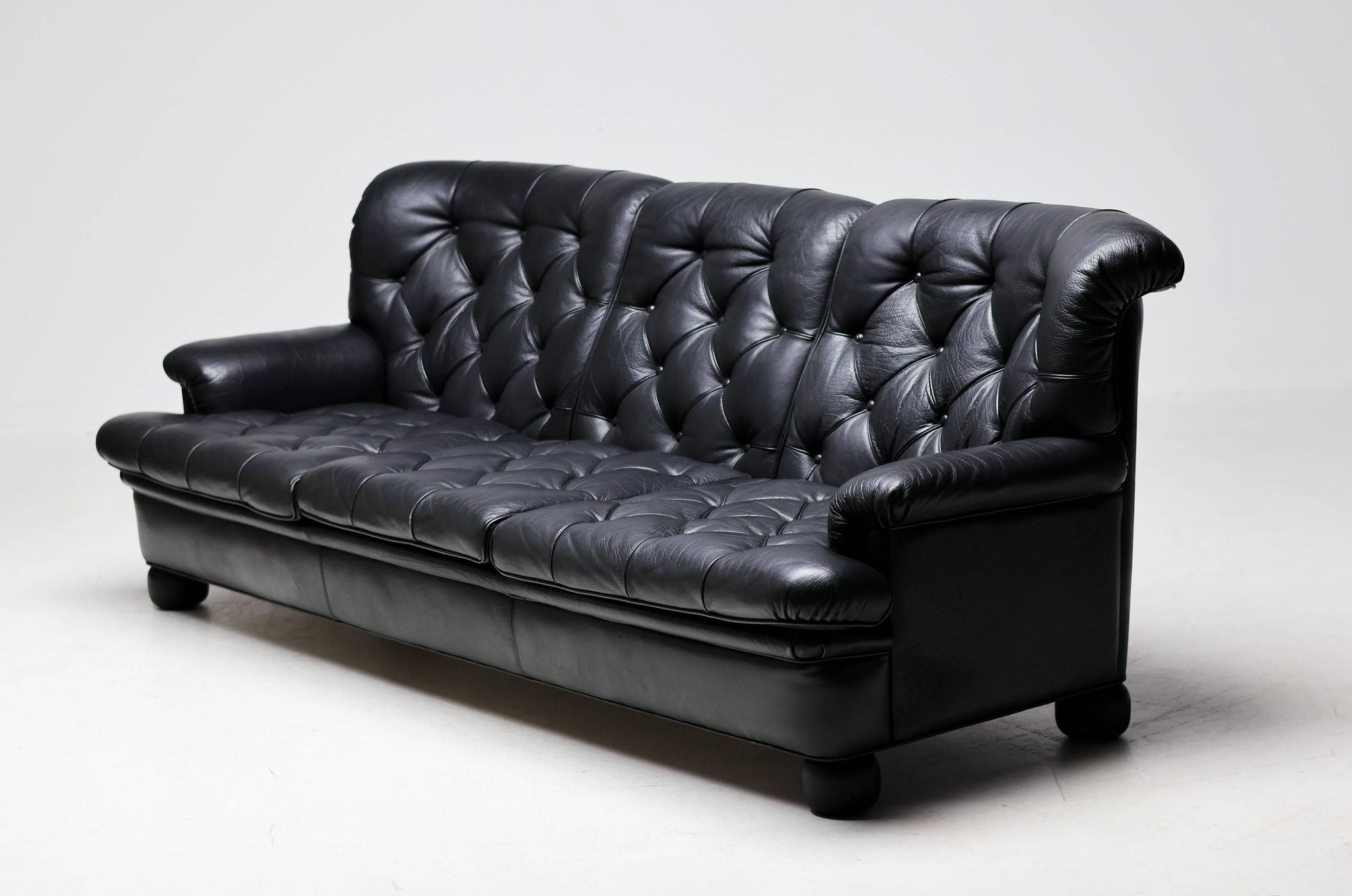 Three-seater sofa "Jupiter" in black leather by Arne Norell, Sweden, 1960.