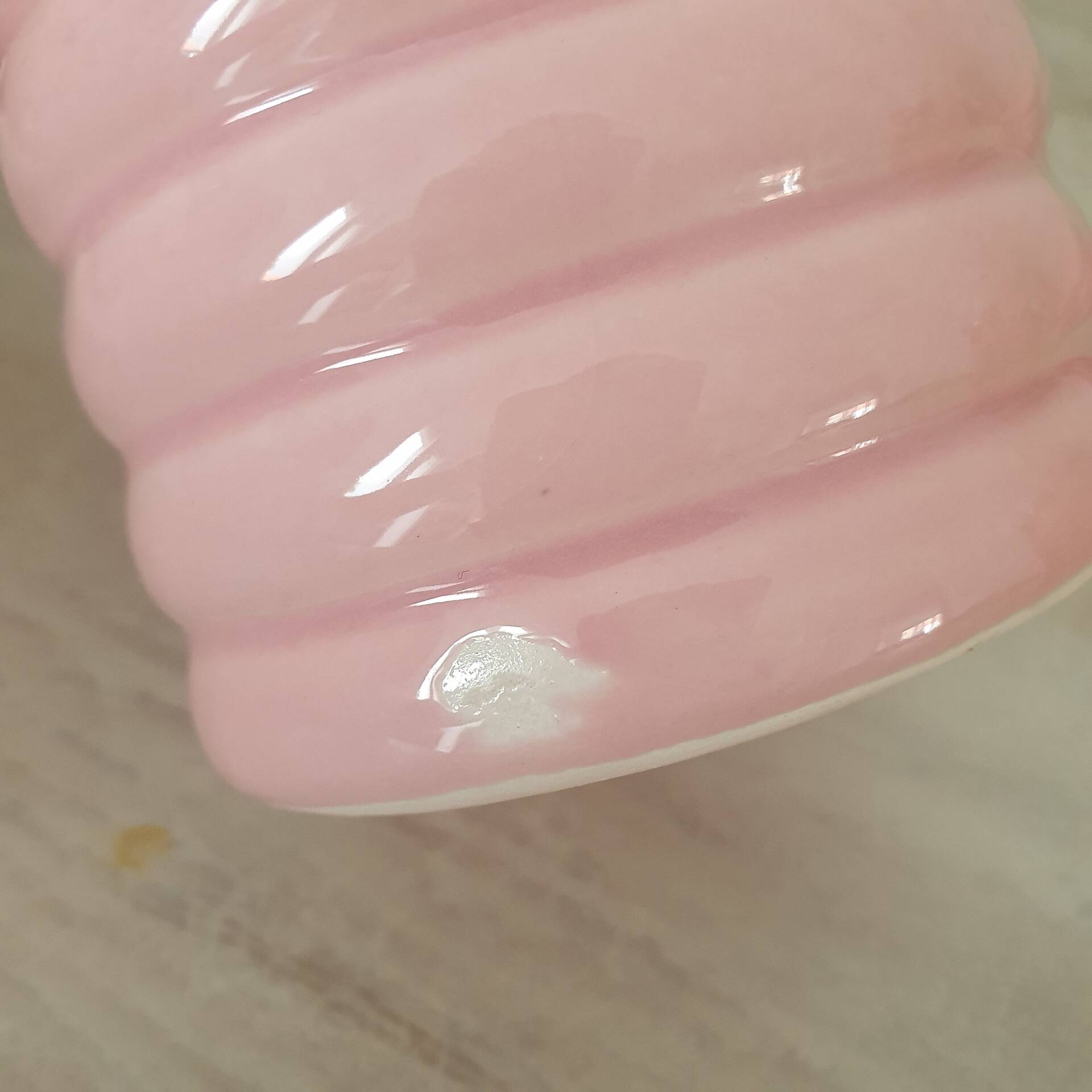 Set of pink and gold ceramic bathroom accessories