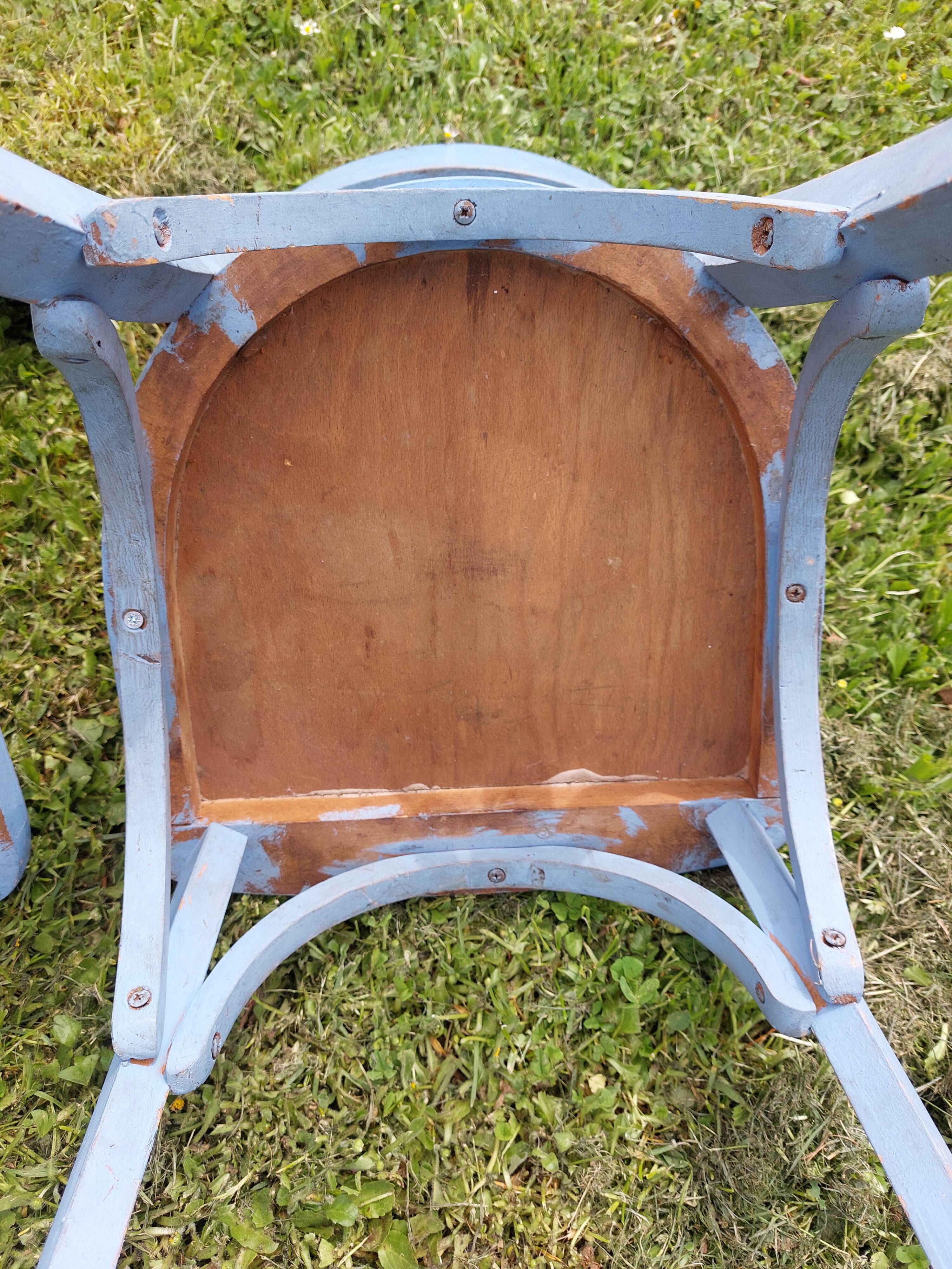 pair of chippy blue paint bistro chairs