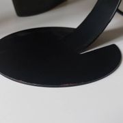 A pair of well-designed minimalist bedside lamps.