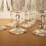 Ensemble de 12 flûtes à champagne, modèle “Versailles”, Cristal d’arques, 70’s.