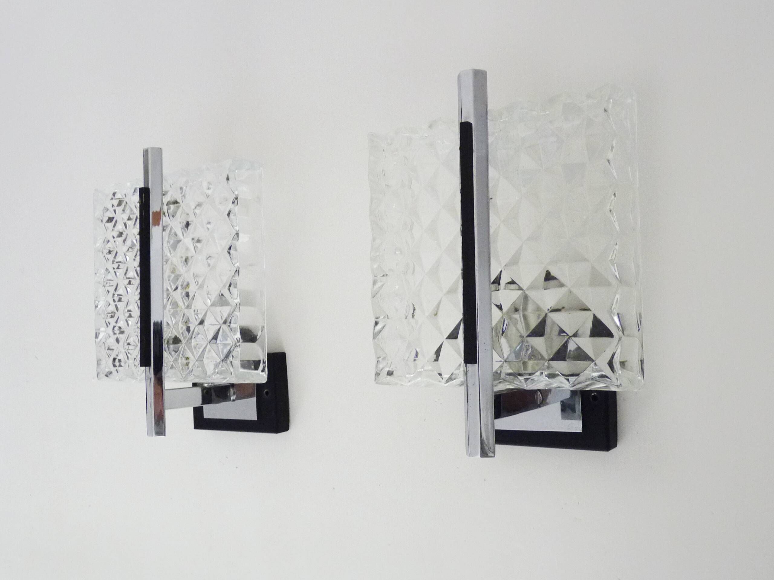 Pair of modernist glass and chrome metal wall sconces. 1960s-70s