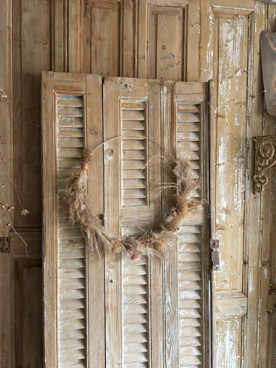 Trio of antique castle shutters