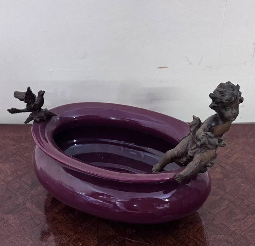 Catch-all or decorative bowl combining a ceramic container.