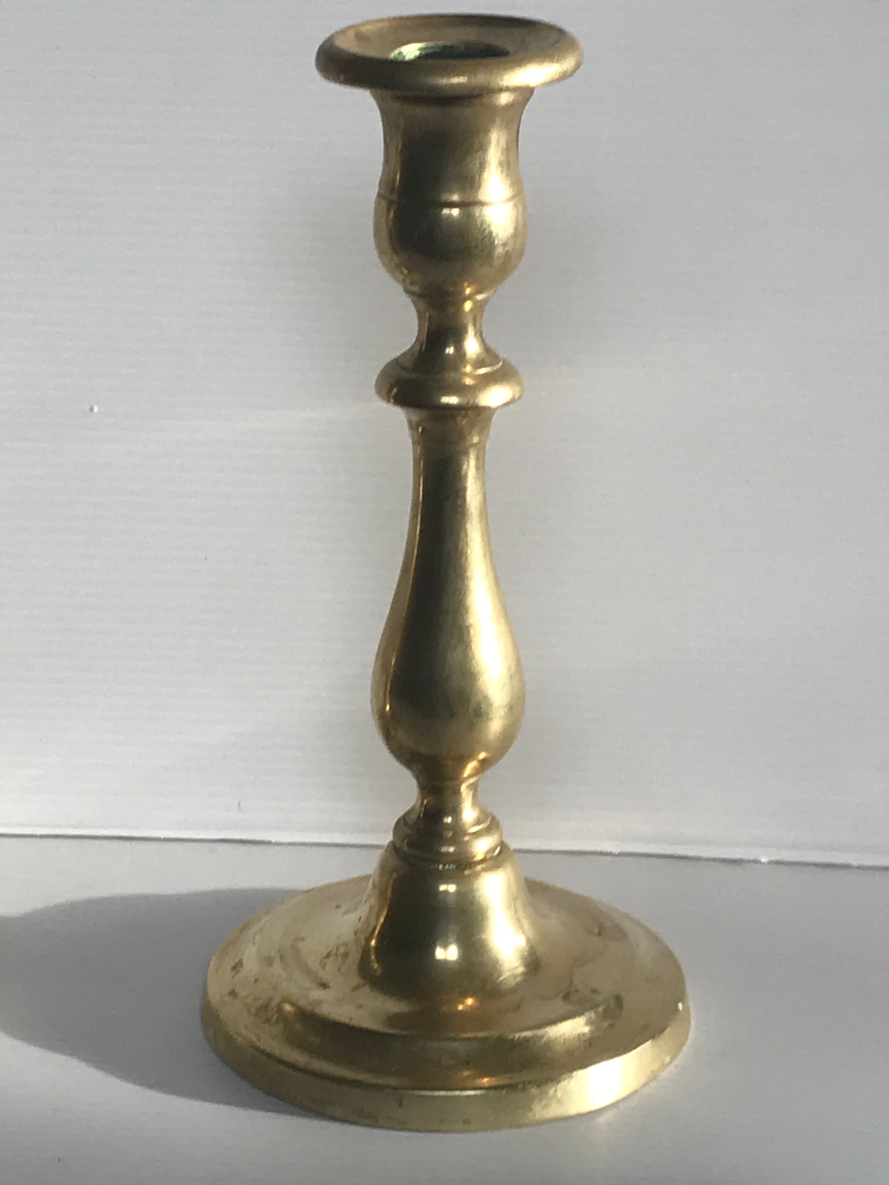 Pair of brass candle holders