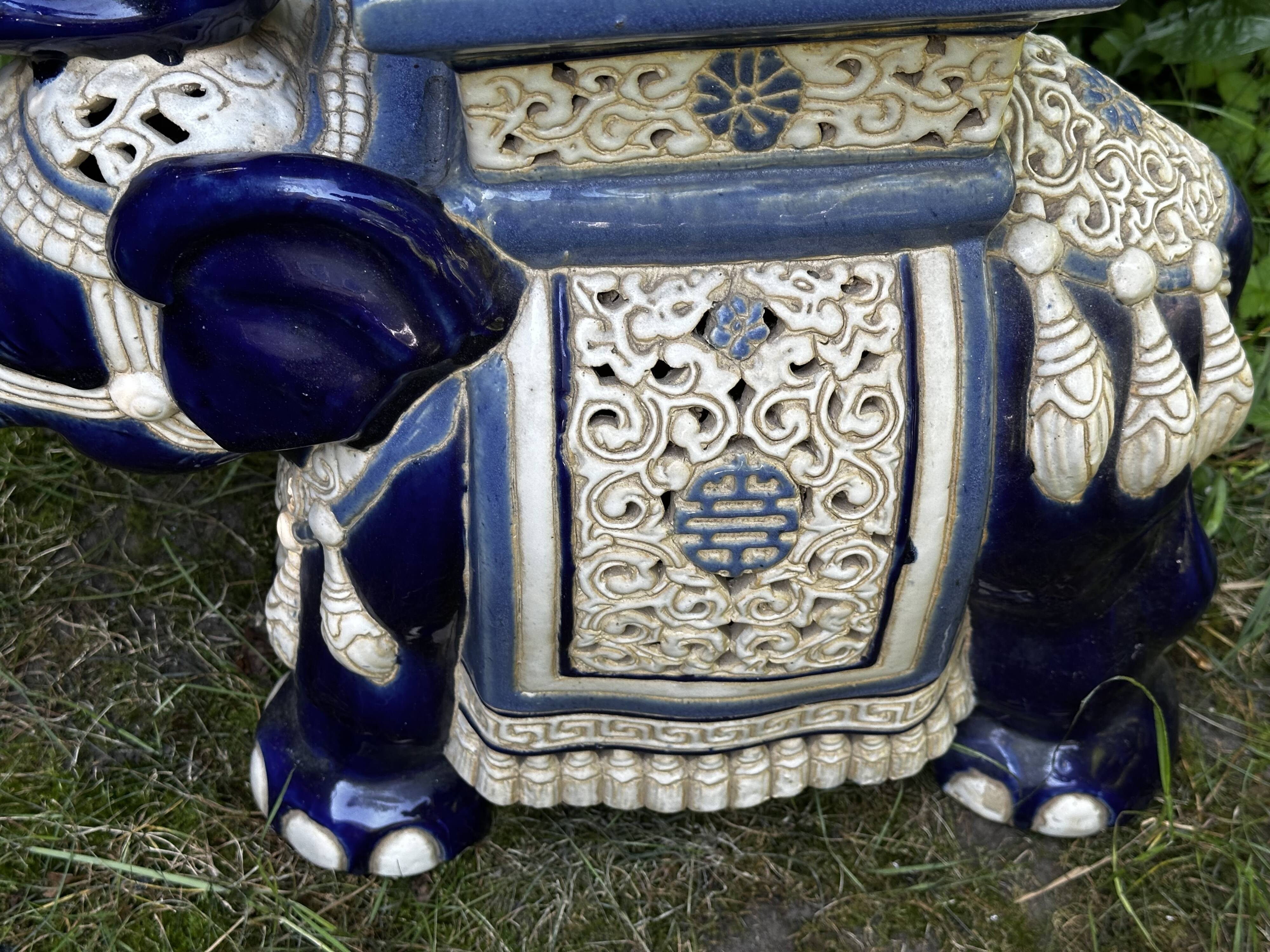 Elephant stool in glazed ceramic in cobalt blue and ivory colors