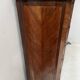 Transitional style chest of drawers in rosewood and amaranth veneer, 20th century.