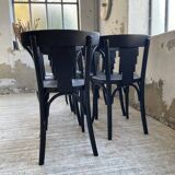 Set of 7 black bistro chairs