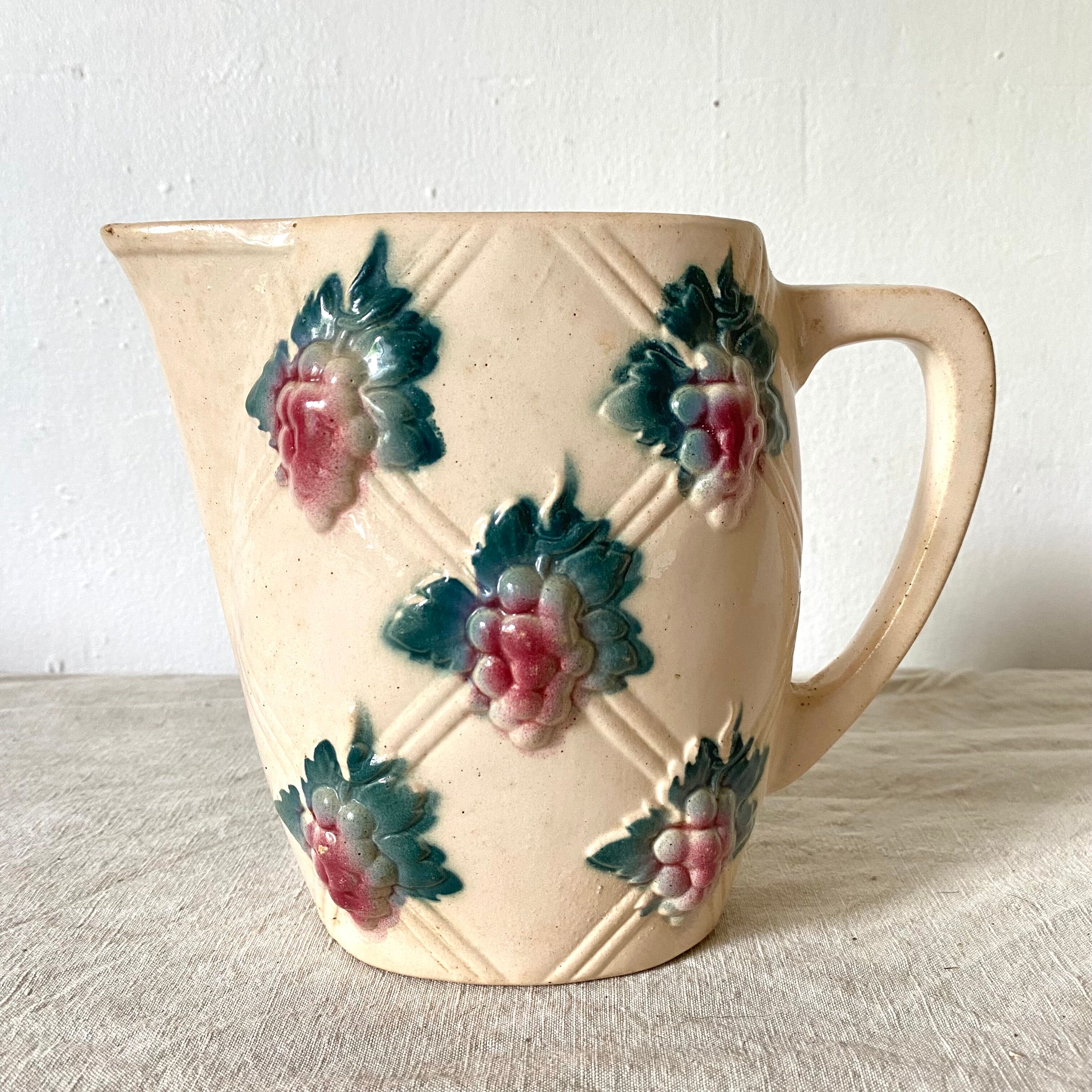 Antique pitcher in Digoin slip