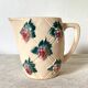 Antique pitcher in Digoin slip