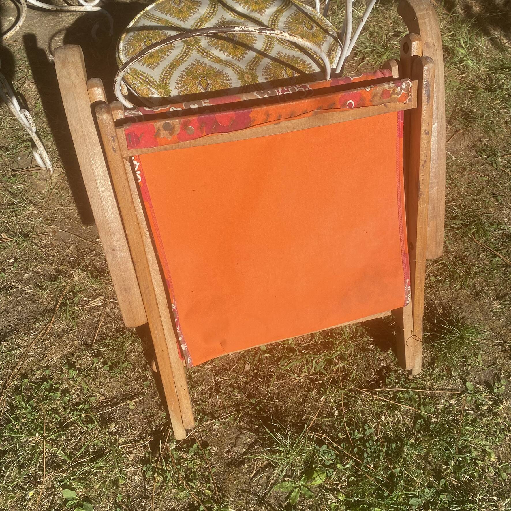 Vintage beach or garden chair made of wood and floral fabric, 1970s.