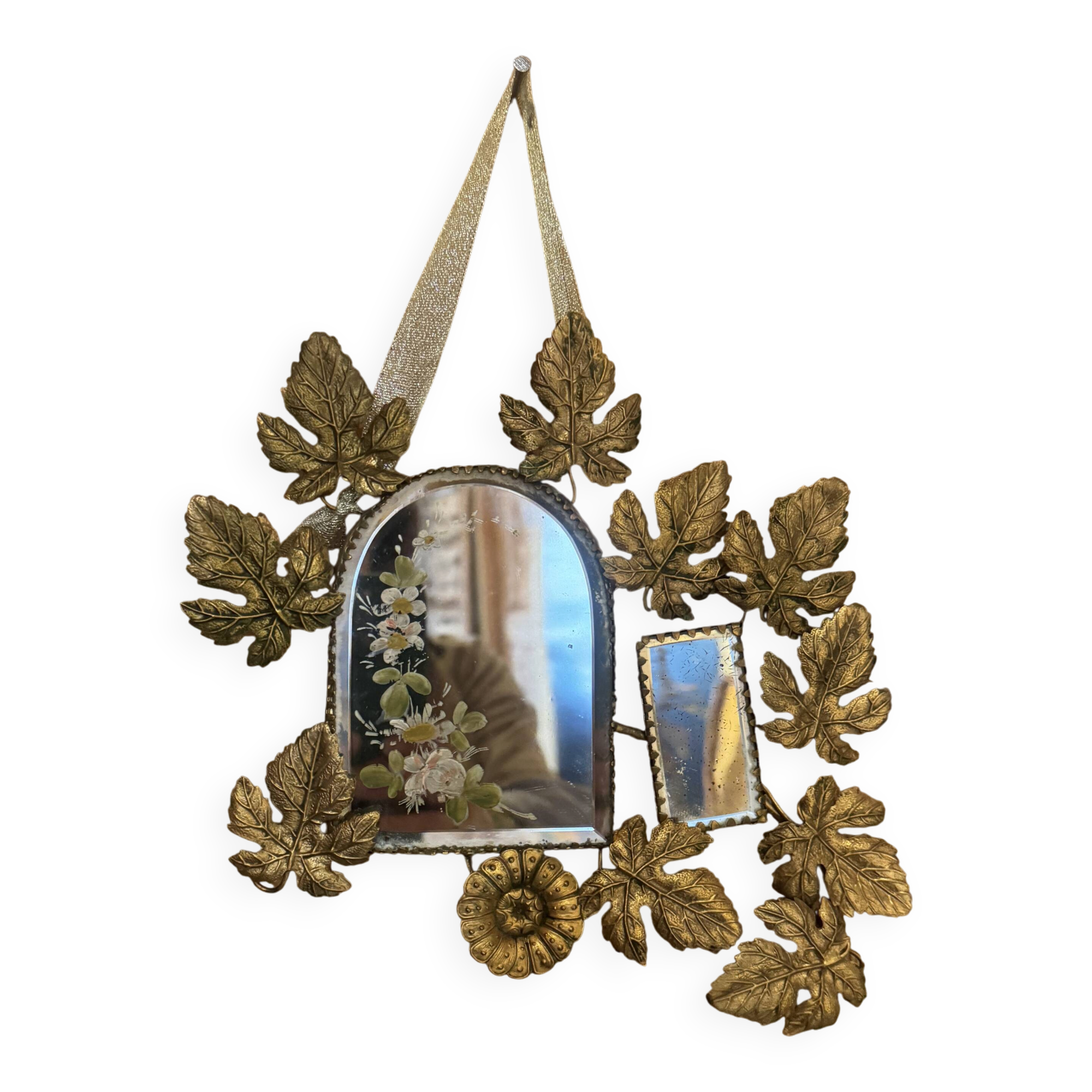 Ornamental brass mirror