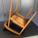 A Scandinavian teak skai chair from the 1960s for a vintage desk table.