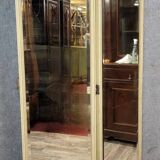 Very large Louis XVI style mirrored screen in lacquered wood circa 1860-1880