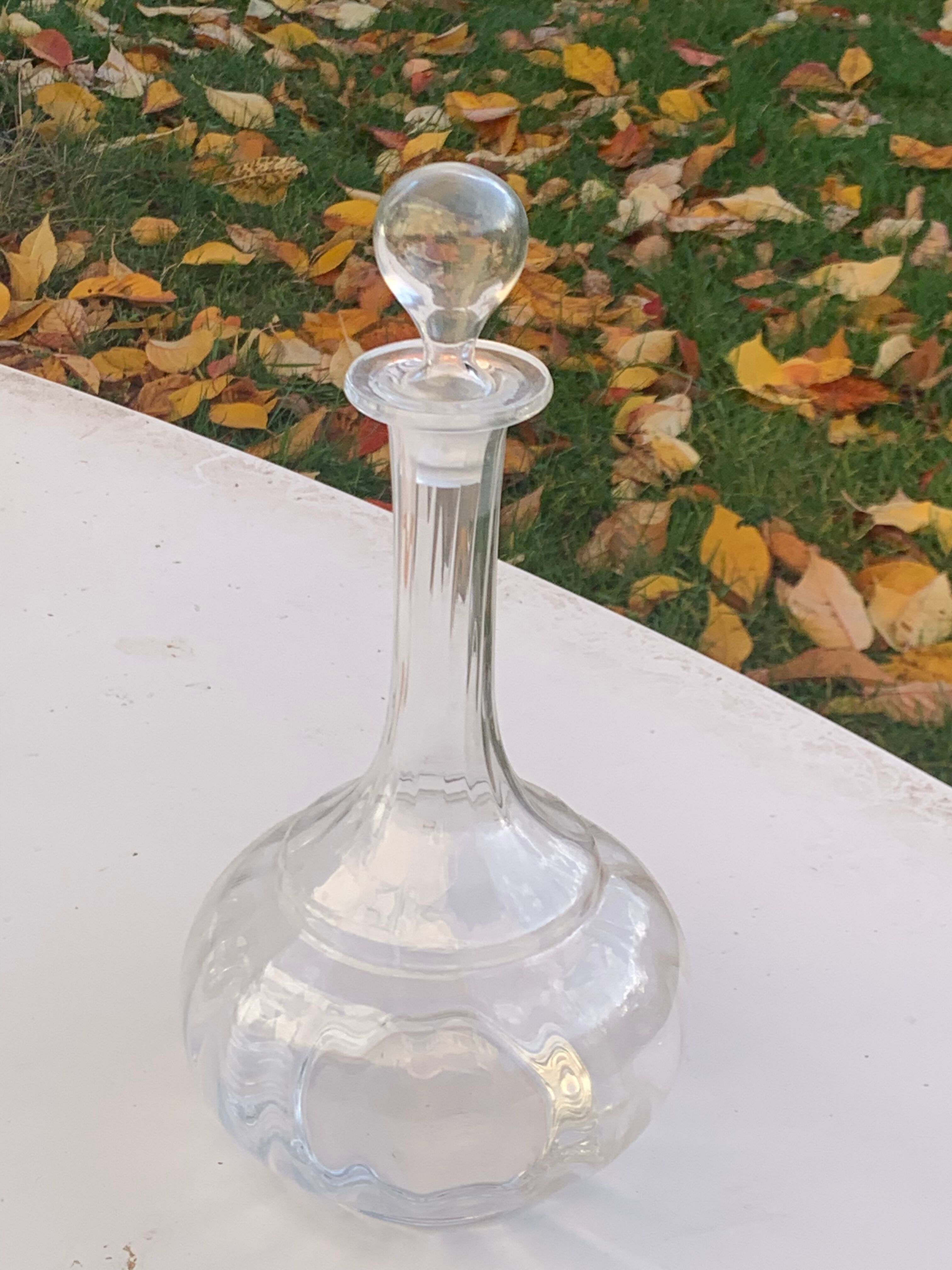 Elegant and vintage transparent glass wine decanter