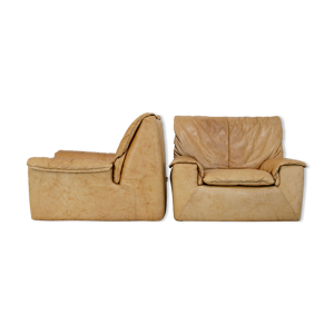 Paire de fauteuils cuir caramel