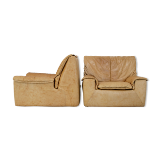 Pair of armchairs leather "caramel" and foam. Cinna. France, circa 1970.