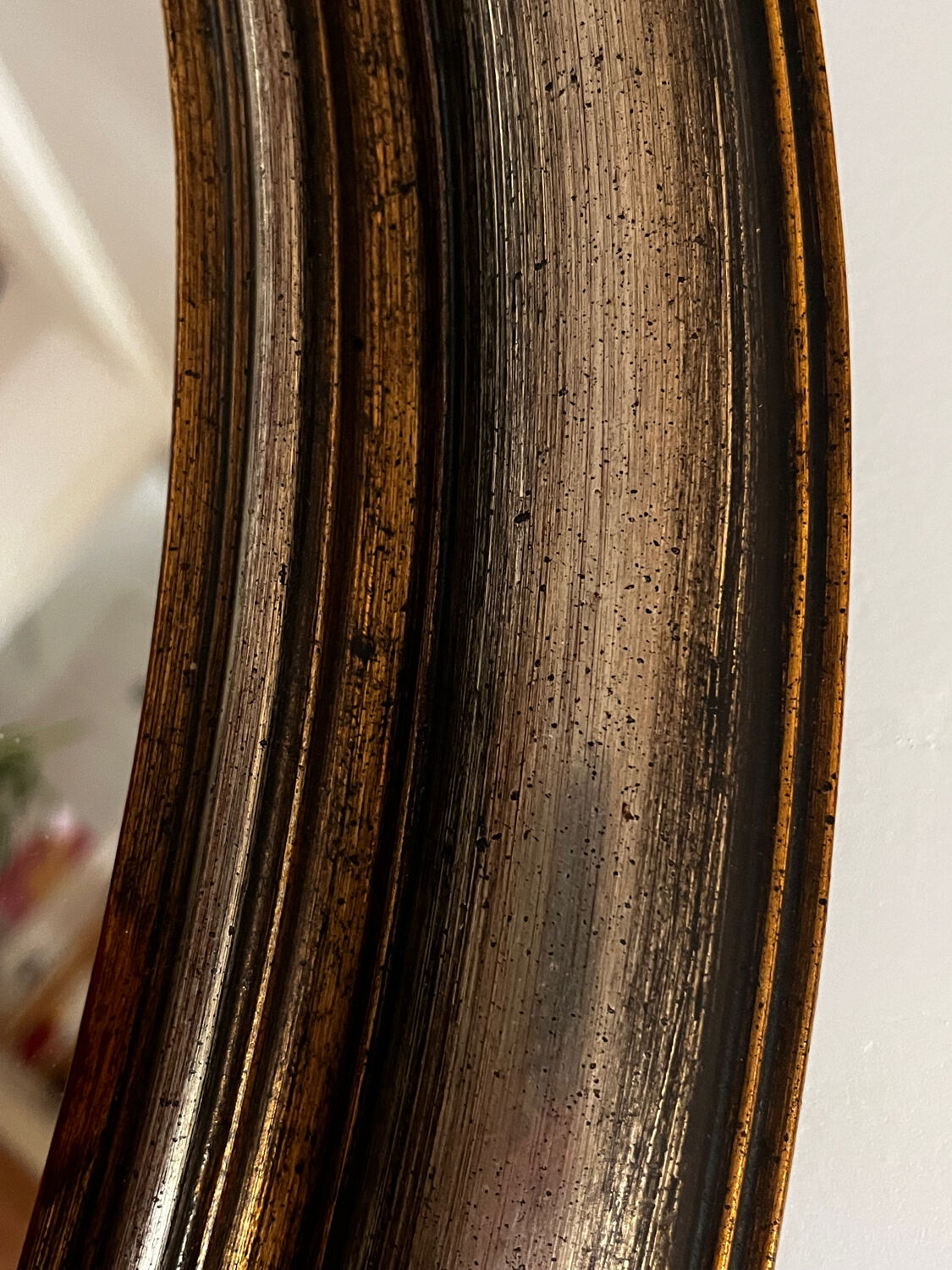 Antique oval mirror made in Belgium.