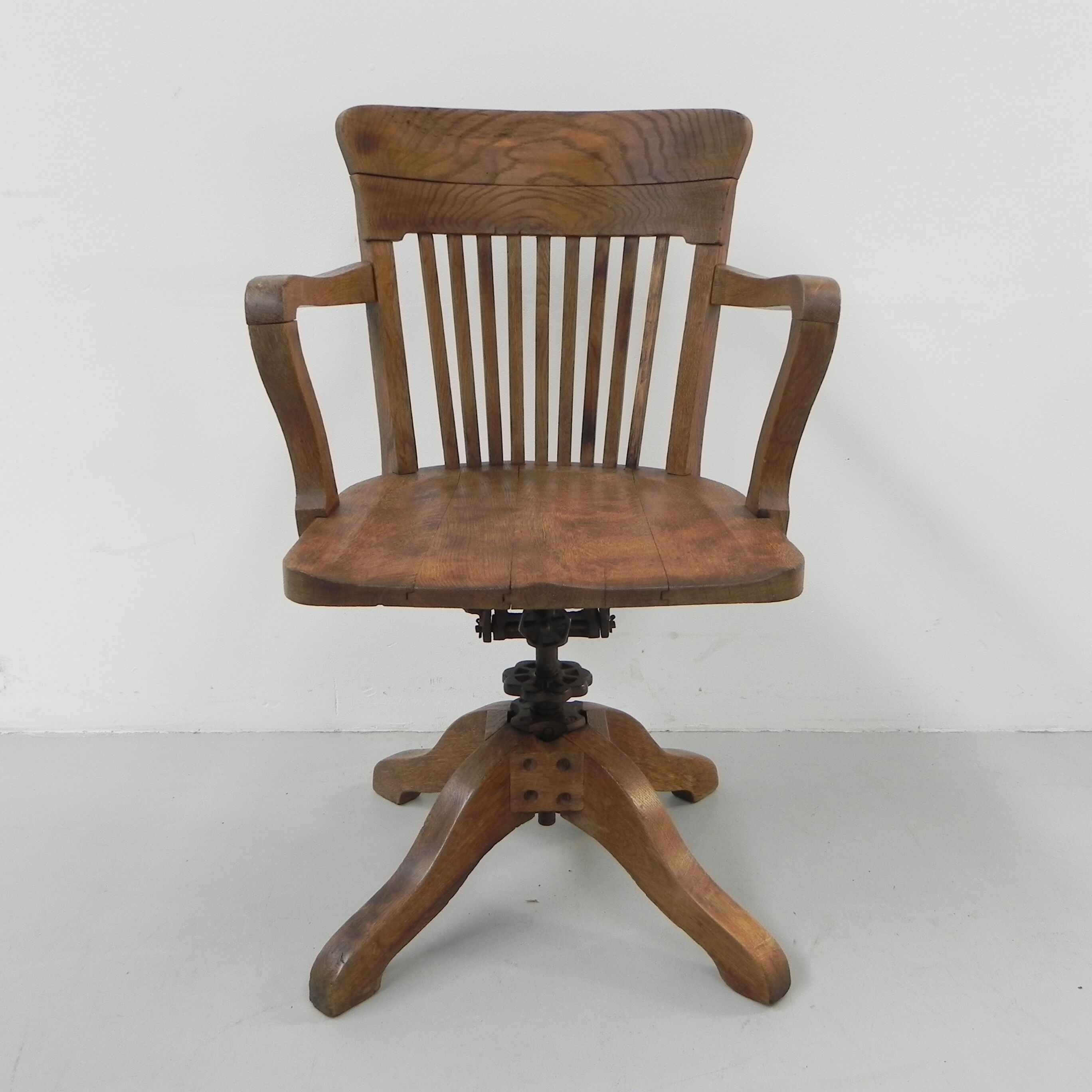 Oak office chair with spring mechanism and armrests