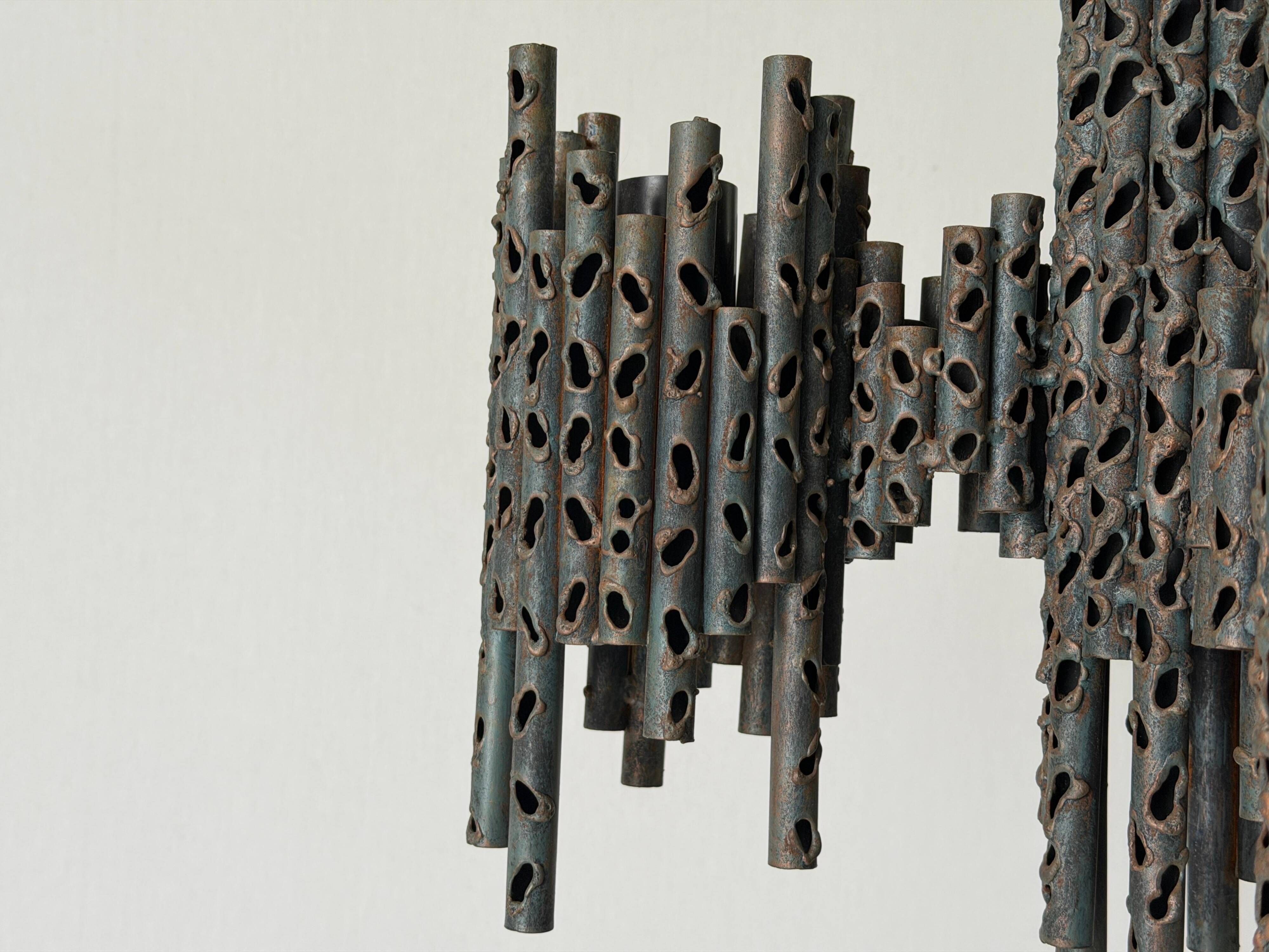 Three-armed suspended lamp in wrought iron, brutalist design, 1960s, Italy.